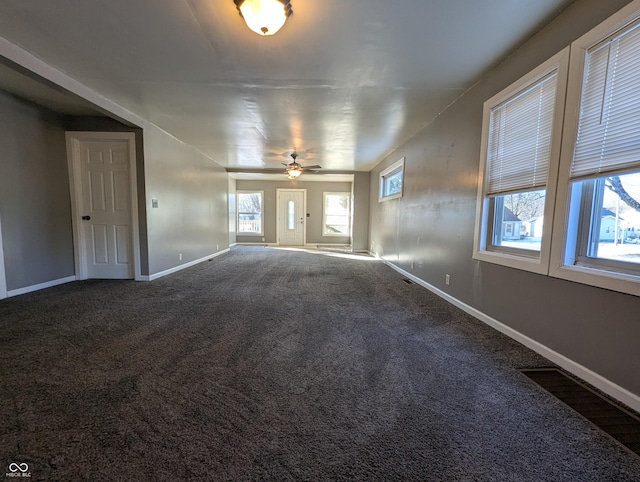 interior space featuring ceiling fan