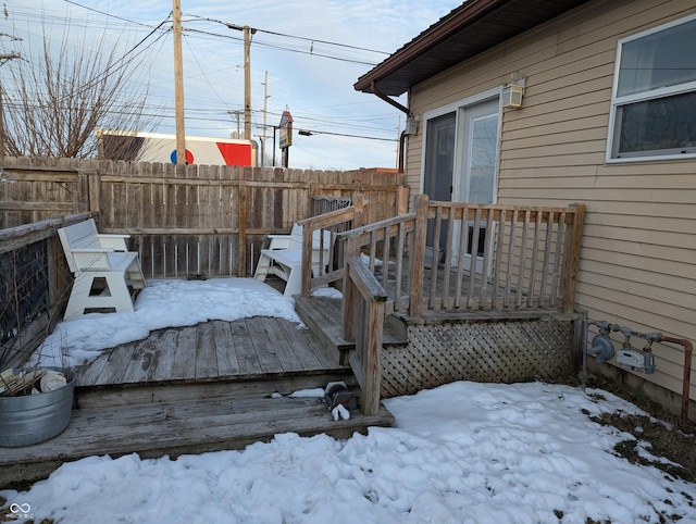 view of snow covered deck