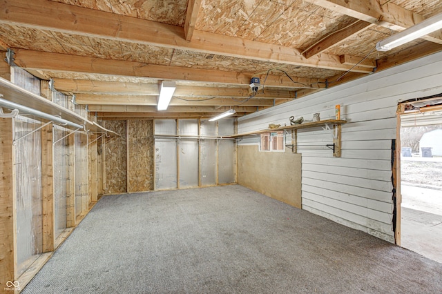 basement featuring carpet flooring