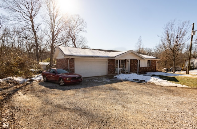 ranch-style home with a garage