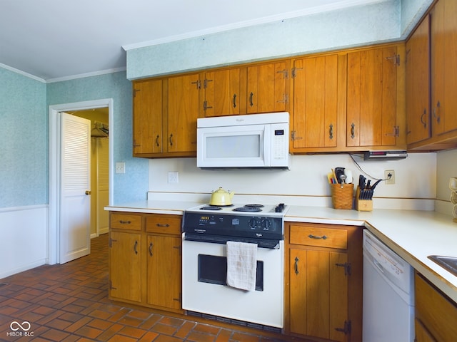 kitchen with white appliances and ornamental molding