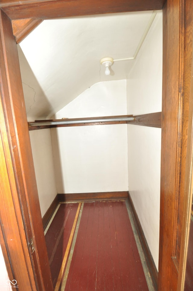 walk in closet featuring dark hardwood / wood-style floors