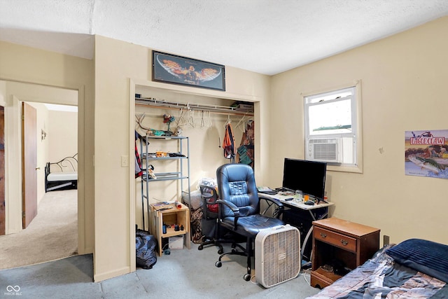 bedroom with a closet and a textured ceiling