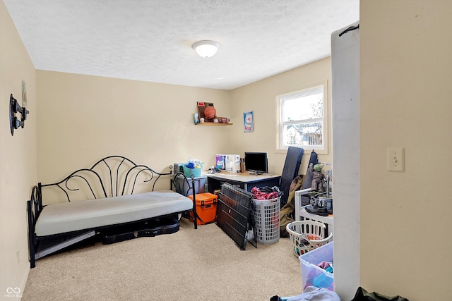 carpeted bedroom featuring a textured ceiling