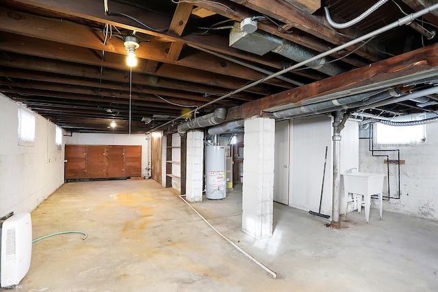 basement featuring gas water heater