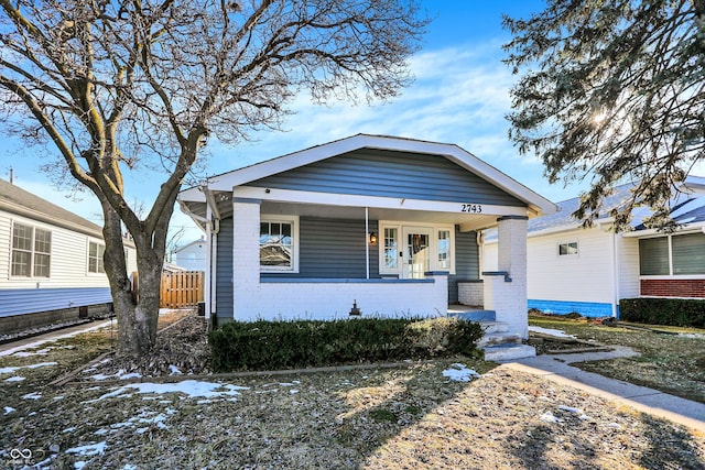 bungalow-style house featuring covered porch