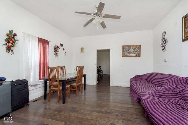 dining space with ceiling fan, dark hardwood / wood-style floors, and a wealth of natural light