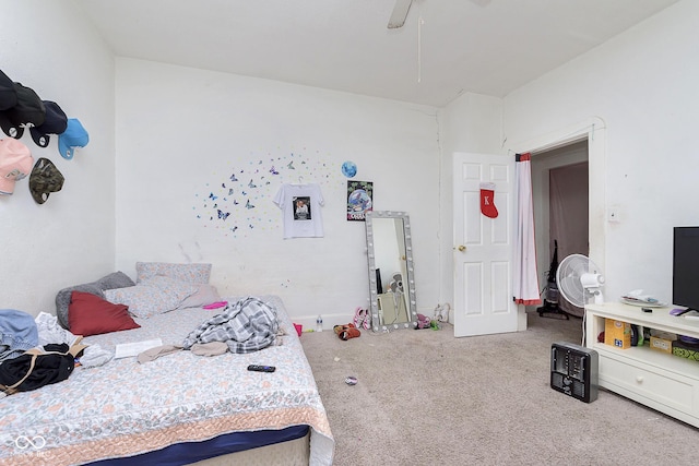 bedroom featuring ceiling fan, carpet flooring, and electric panel