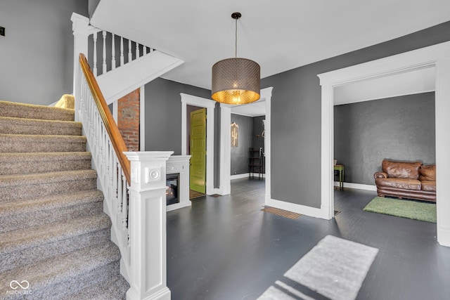 stairway with concrete floors