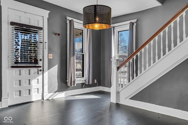 foyer with dark wood-type flooring