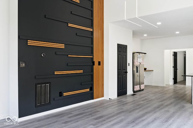 interior space with hardwood / wood-style floors