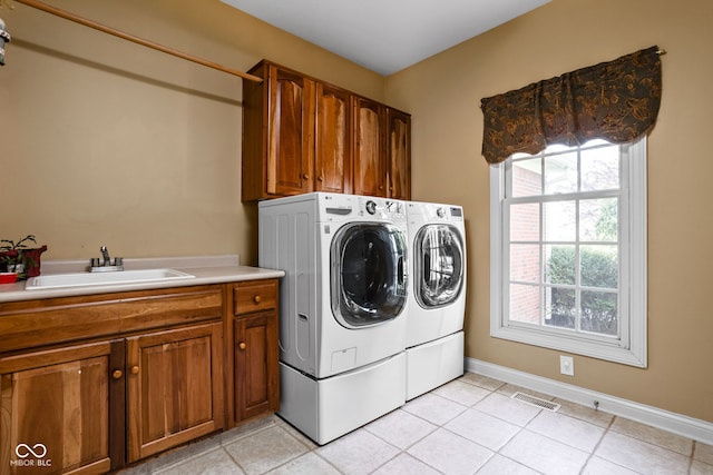 8552 E 550 S, Zionsville, IN 46077 - washroom with independent washer and dryer, cabinet space, and light tile patterned flooring