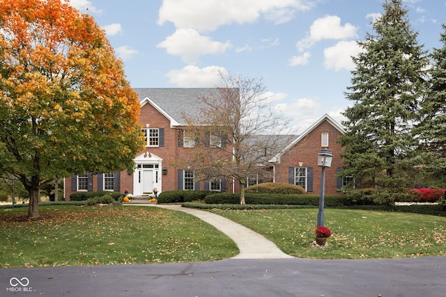 8552 E 550 S, Zionsville, IN 46077 - colonial home featuring brick siding and a front lawn