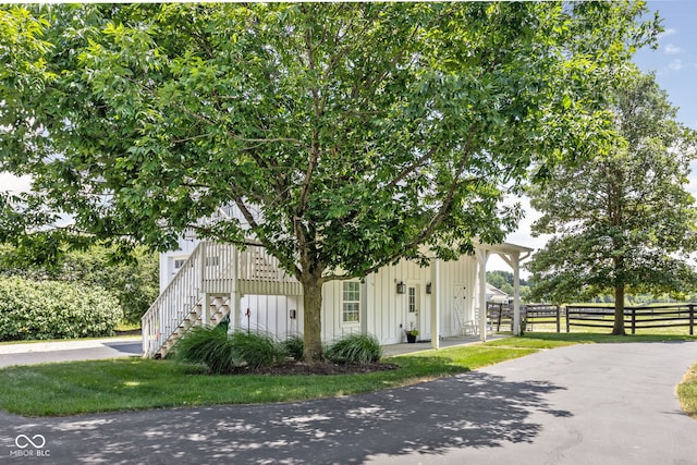 8552 E 550 S, Zionsville, IN 46077 - view of front of house with board and batten siding and stairway