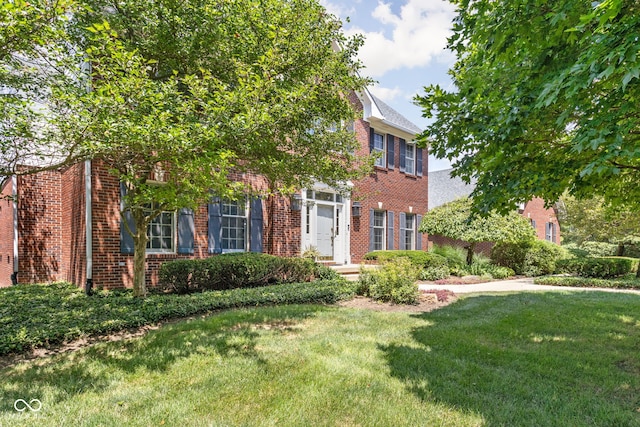 8552 E 550 S, Zionsville, IN 46077 - view of front of property with a front lawn and brick siding