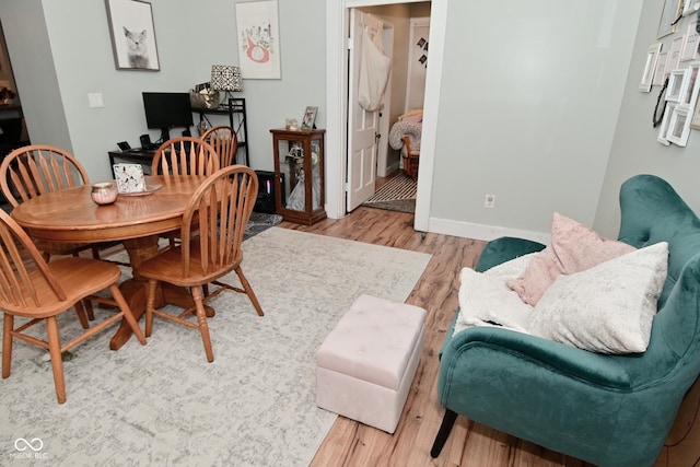 dining room featuring light hardwood / wood-style floors