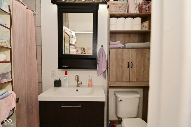 1719 Fletcher Ave, Indianapolis, IN 46203 - bathroom with vanity and toilet