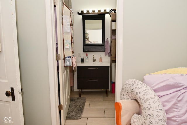 1719 Fletcher Ave, Indianapolis, IN 46203 - bathroom with vanity and tile patterned flooring