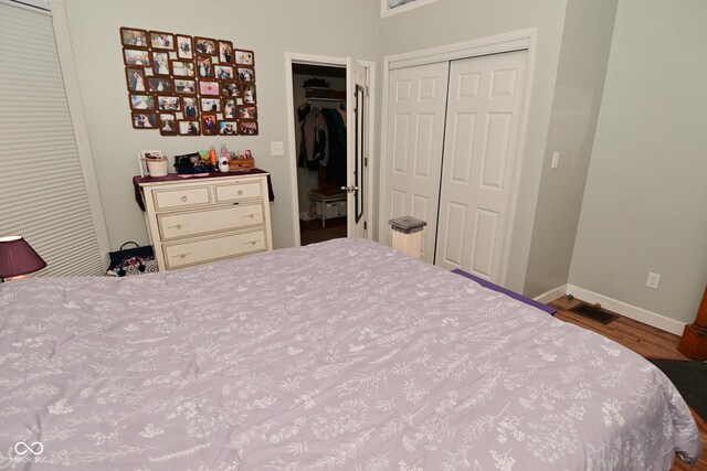 1719 Fletcher Ave, Indianapolis, IN 46203 - bedroom featuring hardwood / wood-style flooring and a closet