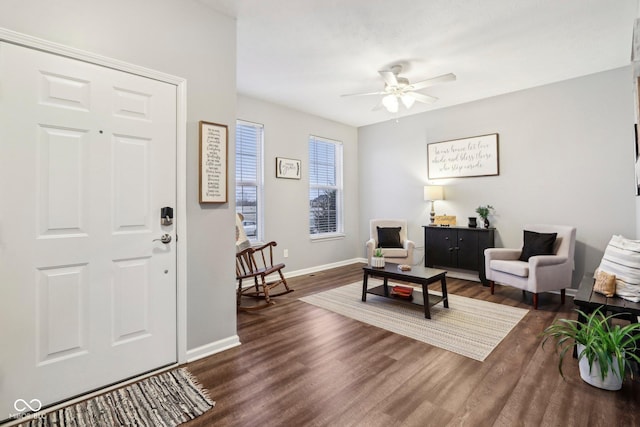 entrance foyer featuring ceiling fan and dark hardwood / wood-style floors