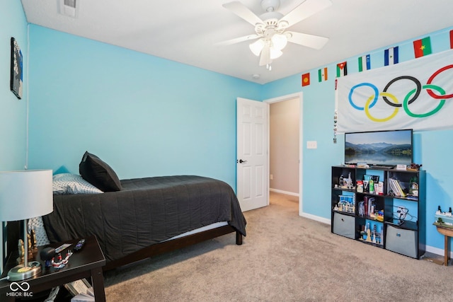 bedroom with ceiling fan and light colored carpet