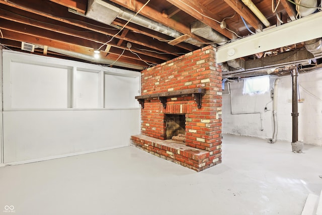 basement featuring a fireplace