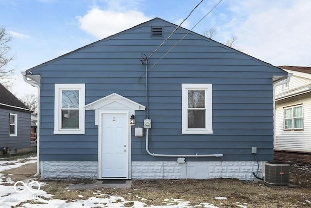 view of front of property with cooling unit