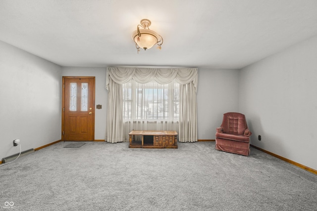 unfurnished room featuring carpet floors