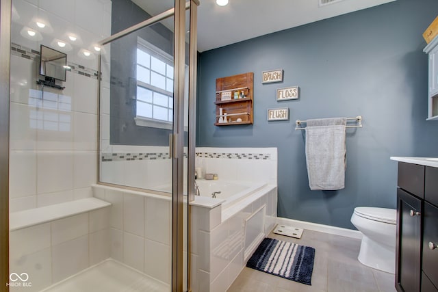 full bathroom with vanity, tile patterned flooring, plus walk in shower, and toilet