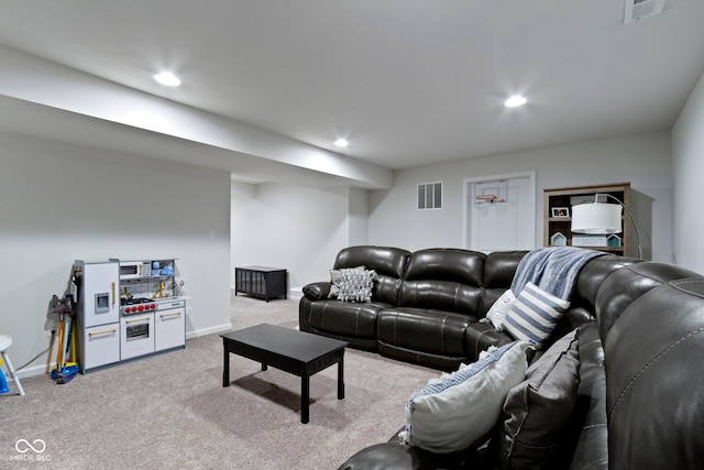 living room featuring light carpet