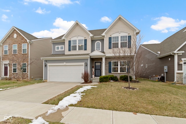 view of front facade featuring a garage and a front yard