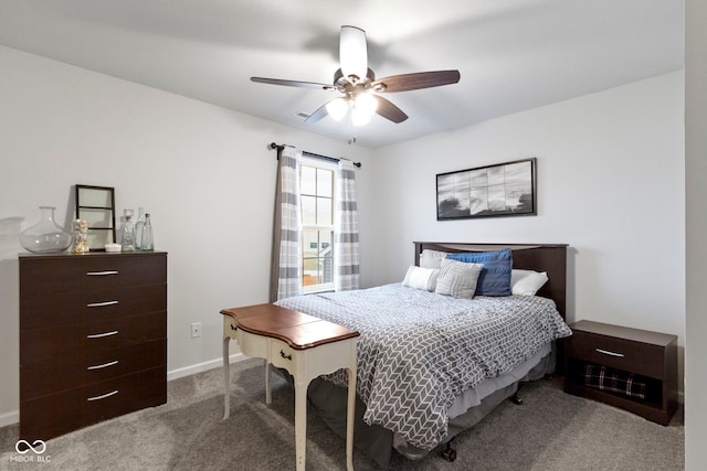 bedroom with ceiling fan and carpet