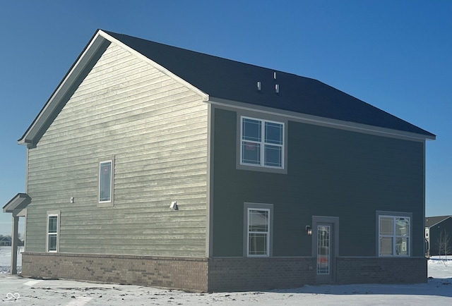 view of snow covered property