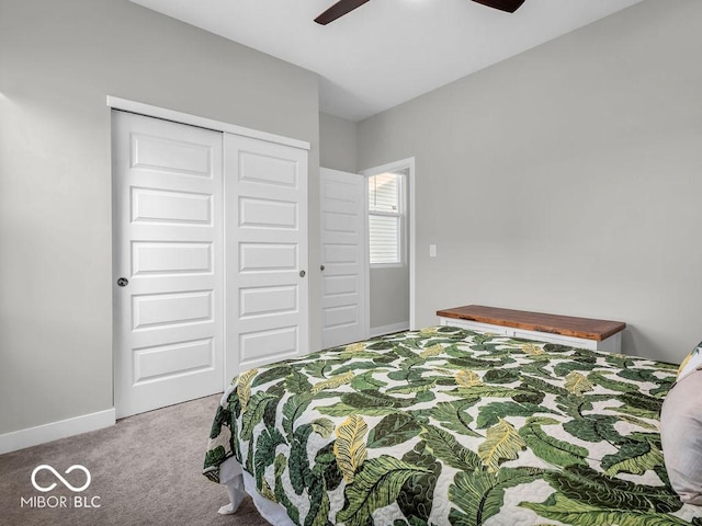 bedroom featuring carpet, ceiling fan, and a closet