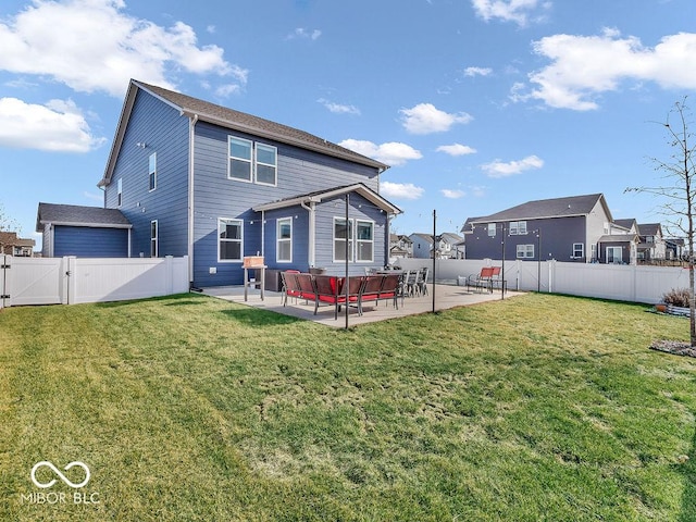 rear view of house with a patio area, outdoor lounge area, and a lawn