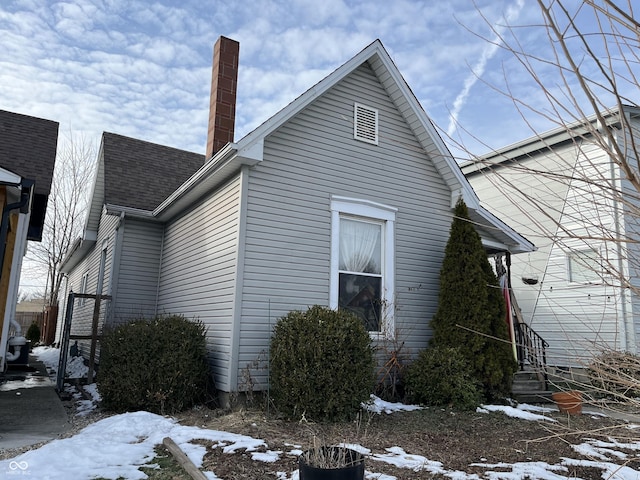 view of snow covered property