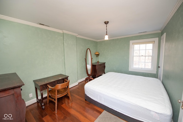 bedroom with dark wood-type flooring and crown molding