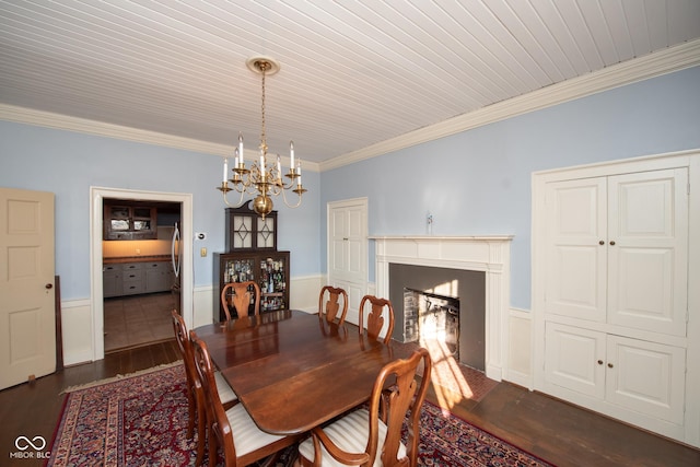 dining area featuring crown molding, wood ceiling, dark hardwood / wood-style flooring, and a notable chandelier