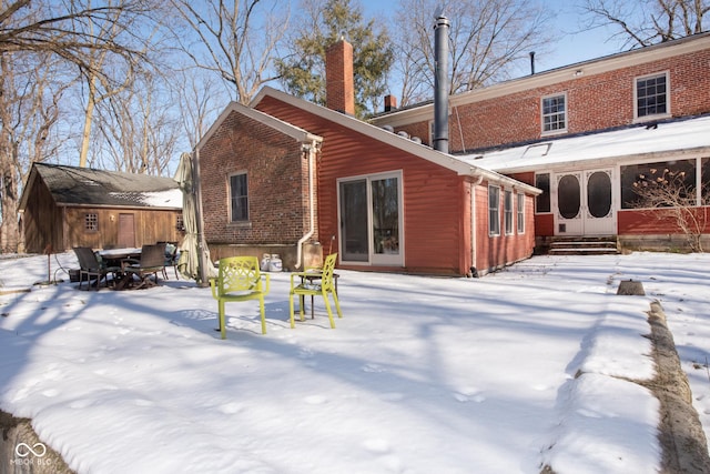 view of snow covered property