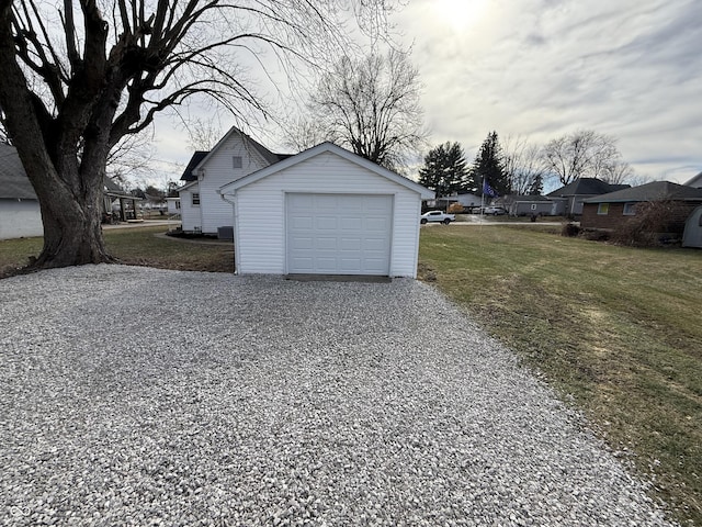 garage with a yard