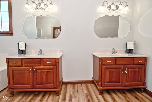 bathroom featuring vanity and wood-type flooring