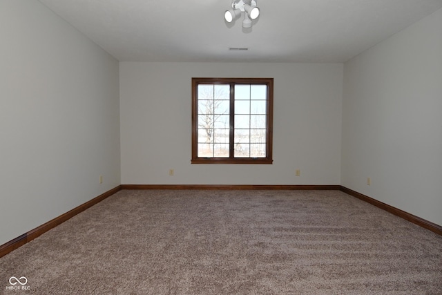 view of carpeted spare room