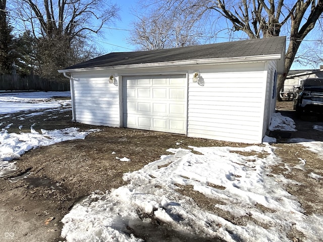 view of snow covered garage