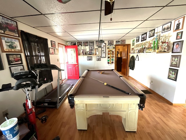 playroom featuring pool table, light hardwood / wood-style flooring, and a paneled ceiling