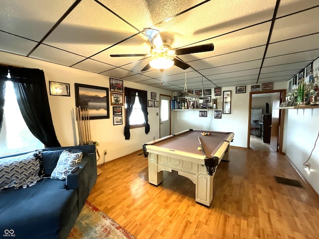 recreation room with pool table, a drop ceiling, ceiling fan, and light hardwood / wood-style flooring