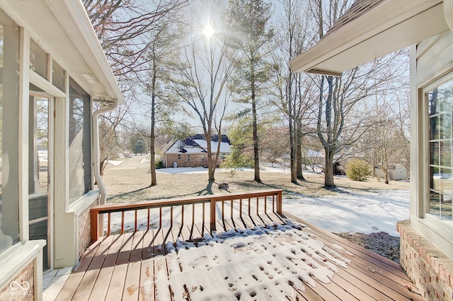 view of snow covered deck