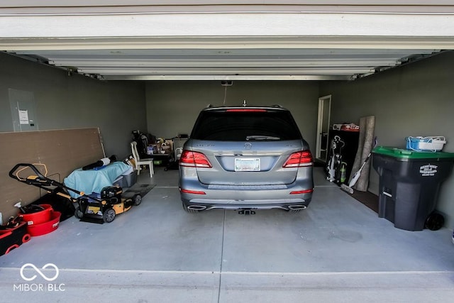 garage featuring a garage door opener