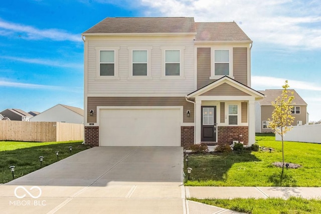 view of front facade with a garage and a front yard