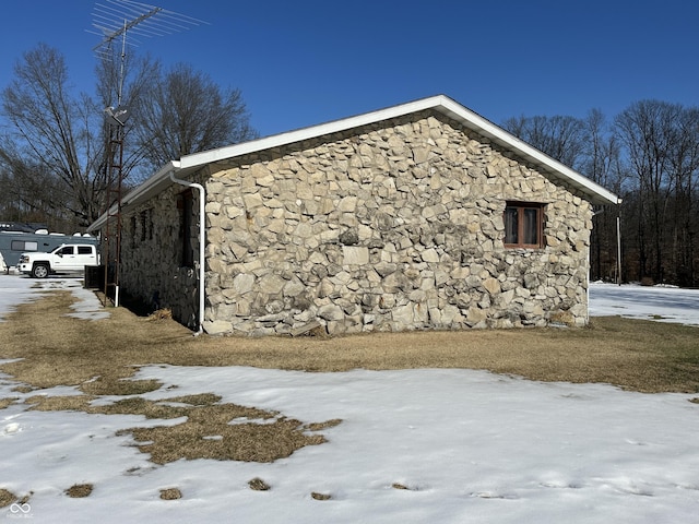 view of snow covered property