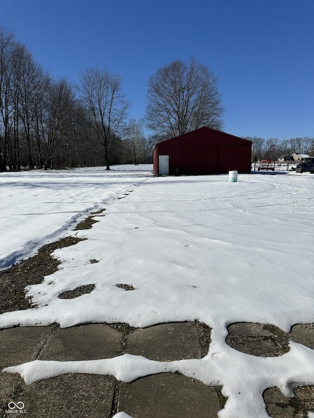 view of yard covered in snow